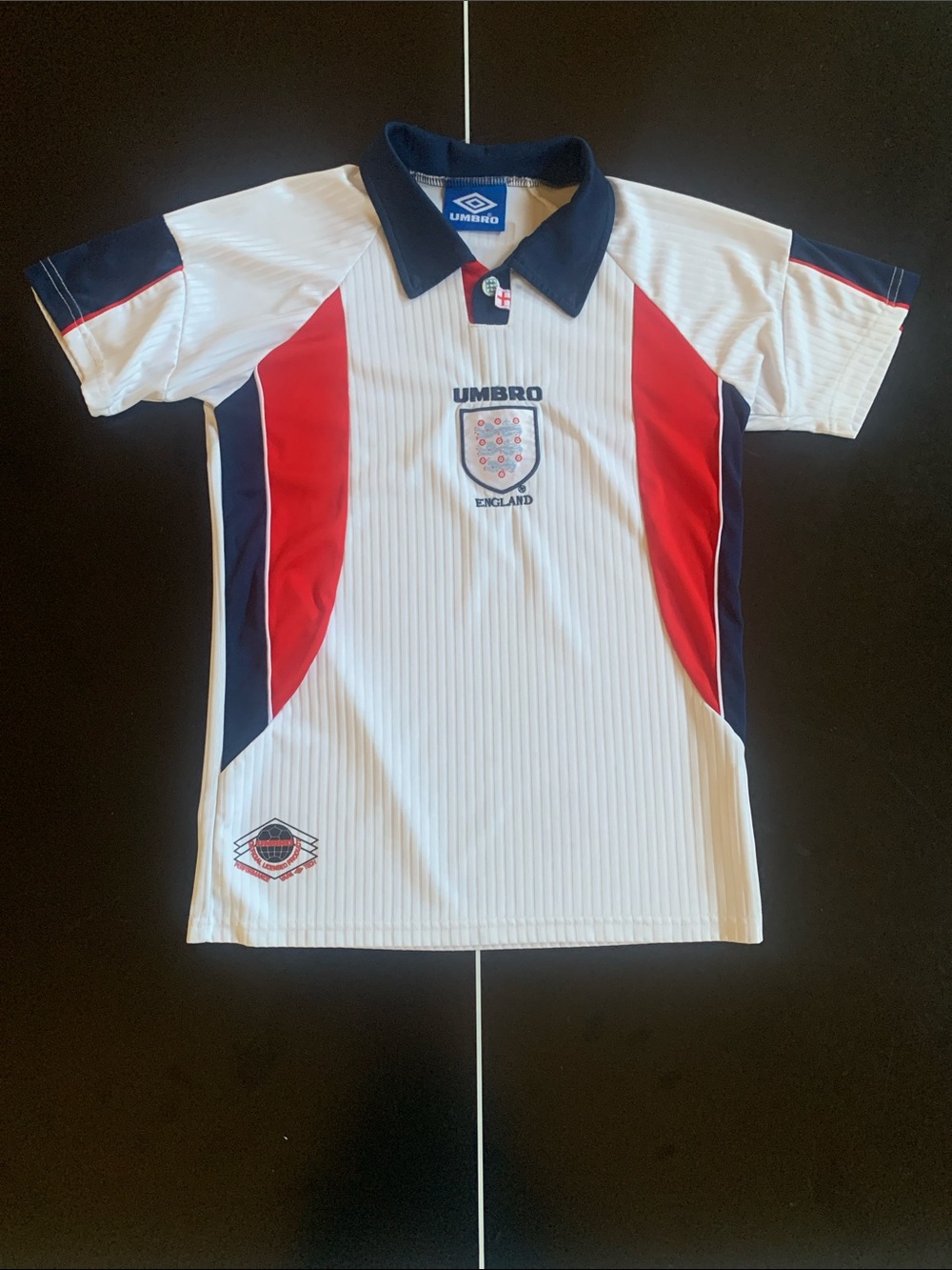 Umbro Kids White, Red & Navy England Soccer Polo.